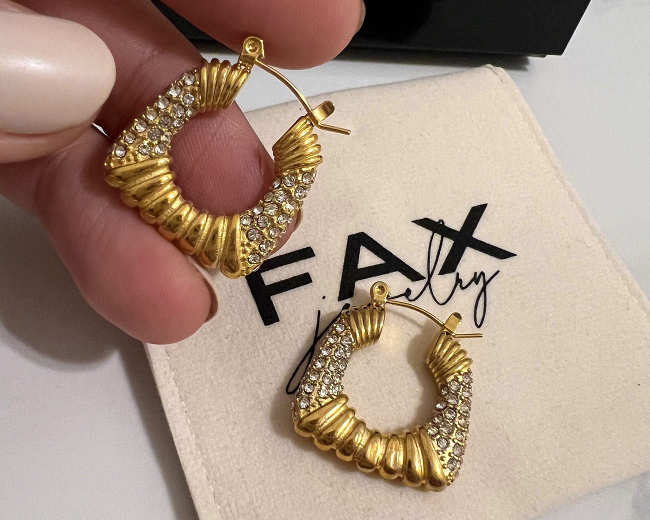 FAX Jewelry | 'Cleo' Square Hoop Earrings | Latch Back | Emerald Green Zircon Stones Against 18 karat gold plated stainless steel | Model View