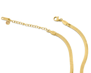 'Haute Herringbone' 18k Gold Plated Stainless Steel Necklace | 18-karat gold plated stainless steel herringbone chain necklace with lobster clasp closure | detail view