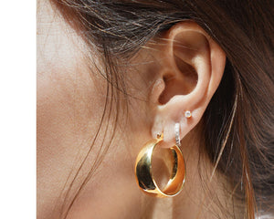 FAX Jewelry | 'Still Standing' Medium Hoop Earrings | 18 karat gold plated stainless steel hoop latch closure earrings 